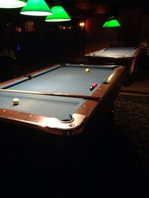 Two pool tables. You can play with dancers