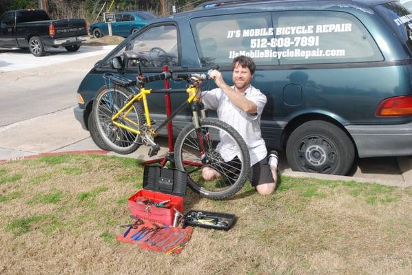 Tuning up a bike on the spot.