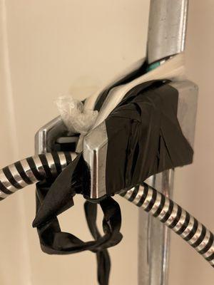 Electrical tape on the shower head