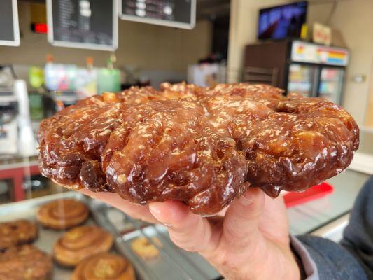 Gigantic apple fritter with crispy edges.  Even tastes great the next day!