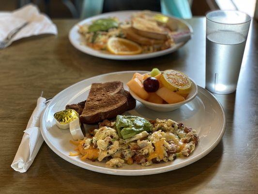 Farmers Scramble with side of fruit and wheat toast.