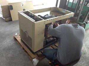 Solcar Electric technician repairing a generator