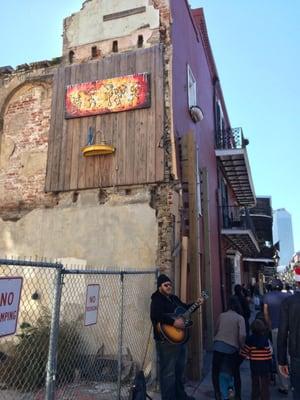 Reggie's Art can also be seen on Royal Street, near St. Louis.  LOOK UP!