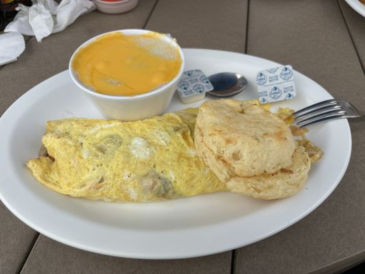 Veggie omelette, cheese grits and biscuit.