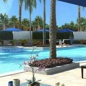 A pool at Azure Palm Beaches