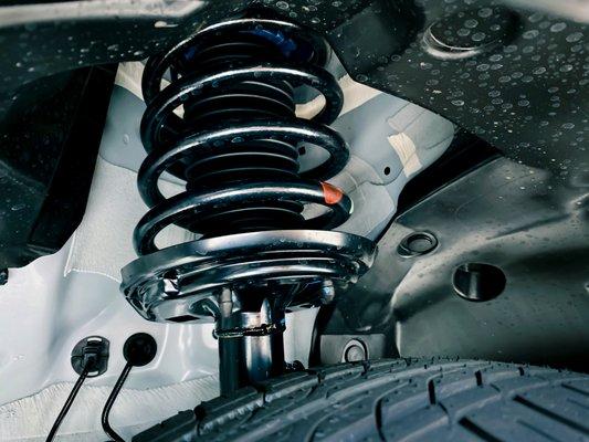 The strut assembly,is an essential part of your car's suspension system, is attached to the front wheels and is used to absorb road shock,