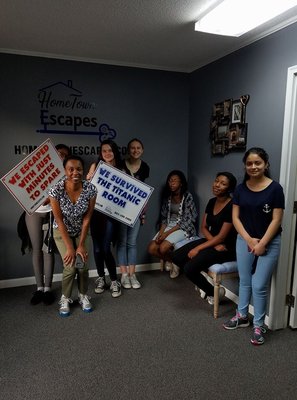 Some of these girls may be a bit camera shy, but they were not shy about sharing clues with their group! Great job!