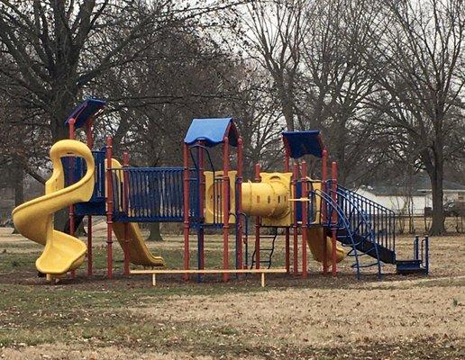 Modern playground with natural surface. (Unfenced.)