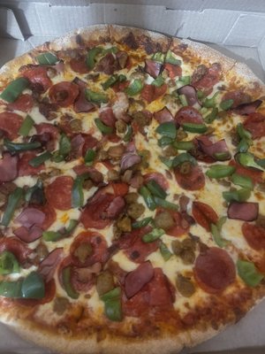 Meat Lovers Pizza with green peppers added