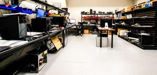 Our organized, clean, & Electrostatic Safe workspace capable of repairing 40 devices at once with 4 technicians