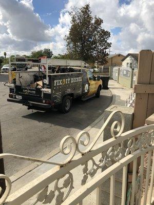 Servicing an owner operator, his big rig was parked in his front yard.