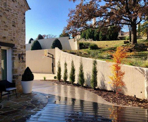 New landscape install! Coral Bark Maples and Taylor Junipers finishes shed off with decorative grasses.