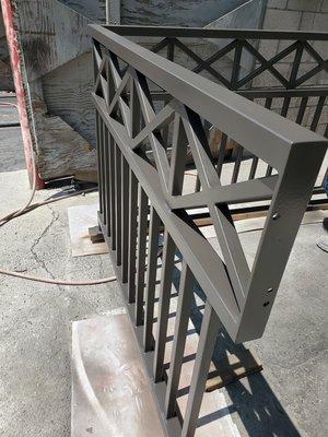 Blast, Prime, and paint with epoxy paint railing for residential project.