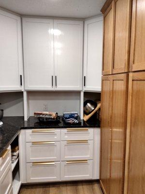 Custom built pantry with granite countertops.