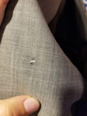 Burned hole in my suit jacket.