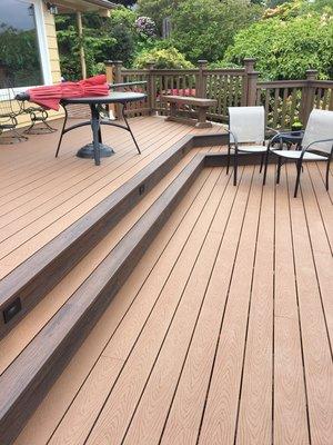 New trex decking accents on step noses with stair lighting