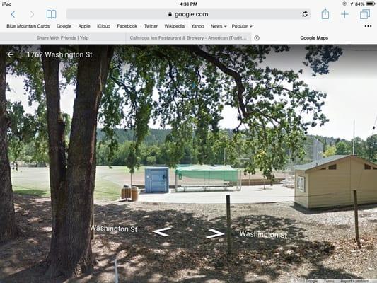 A view of the baseball field and bathroom.