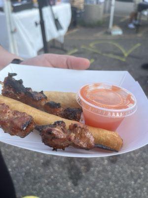 Lumpia and meat skewers