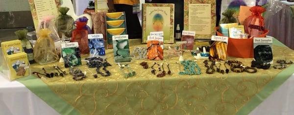 Chakralicious booth - get Chakralicious with gemstone kits, cards and pendulums; Chakra Personality Books, CD's, Mood Mists