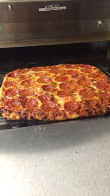 Thin Crust Pepperoni Pizza