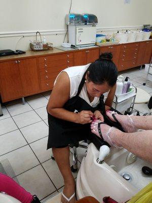 Livia painting moms toes