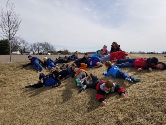 Playing on the hill.