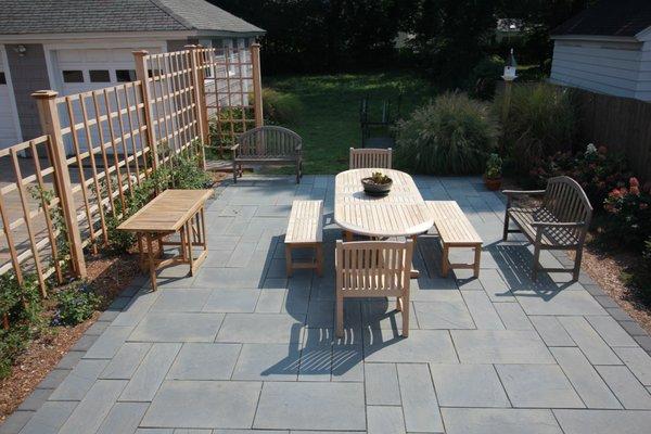 Patio with Gardens & Privacy Screen for Climbing Roses in Milford, CT