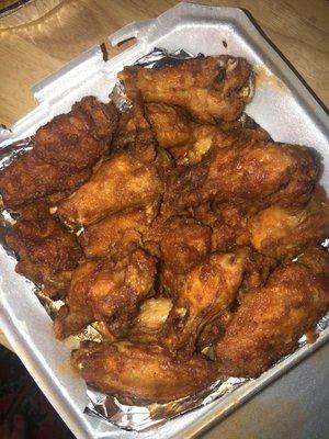 Soggy with enough sauce (on the bottom) to cover 2 wings.