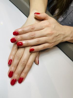 Gel manicure with OPI Big apple red