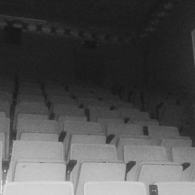 Apparition sitting at top of stairs in old theatre Idaho state.