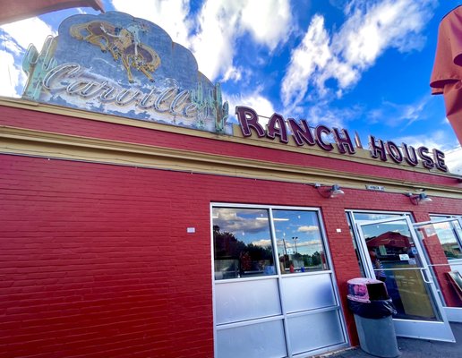 Signage outside, does that read Carville ranch house?