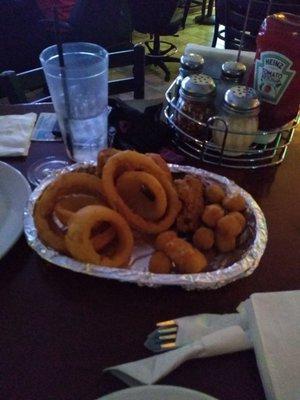 Appetizer the pick 3 for 10$  Cheese curds (with peppers Ahhhmazing) Onion rings Wings (kind of salty but they were ok)