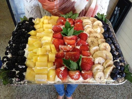 OMG saw this walking out the door a specialty cake topped with seasonal fruit!  By request