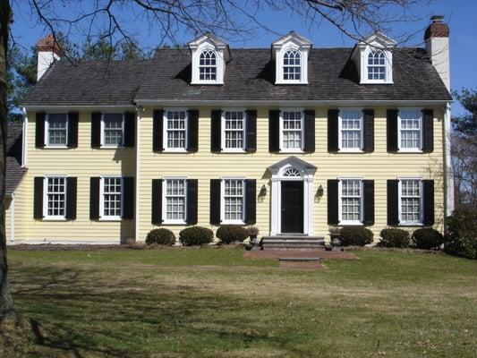 Two story addition with custom dormers,windows and trim