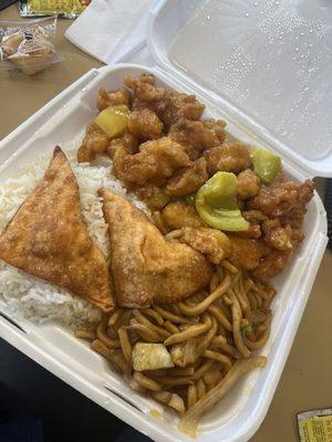 Combo plate with,white rice, chow mein, and Crispy Orange Chicken, and Fried Crab-Cheese Puffs