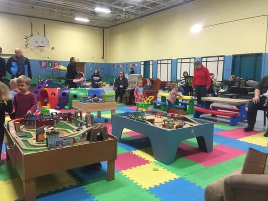 Train tables and cars for the kids to play with