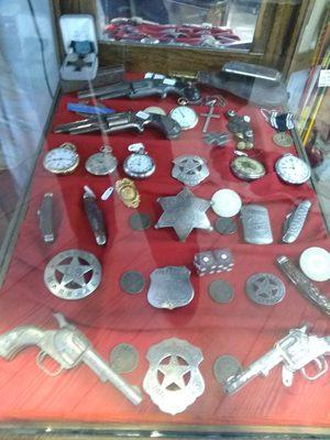 Western badges, pocket watches, pocket knives and more