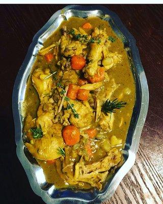 Curry chicken served with white rice,potato salad or bake Mac-n-cheese and veggies