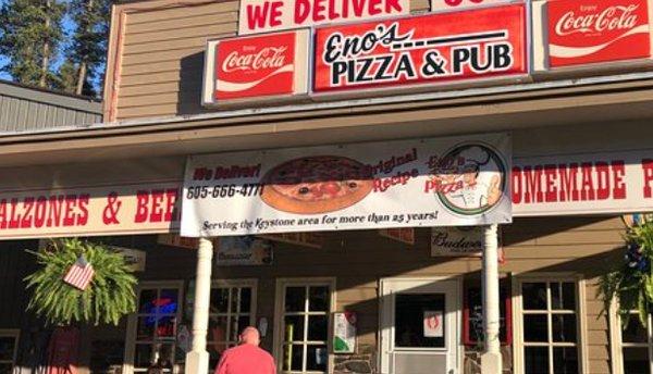 Store front, where you can smell the Pizza aroma.