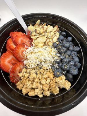 Sweet tooth smoothie bowl! Mixed berry base! Almonds, granola, strawberries, blueberries, coconut, chia seeds and honey or agave drizzle!!