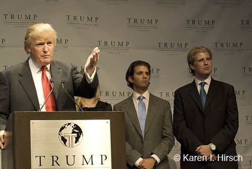 Donald Trump and his sons Don Jr. and Eric at opening of Trump Tower Chicago