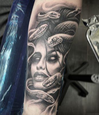 another medusa tattoo, glowing eyes