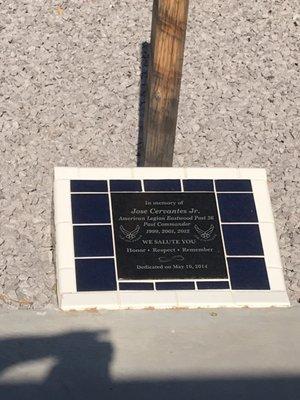 Dedication plaque for a service member, who was a former post commander of this Legion.