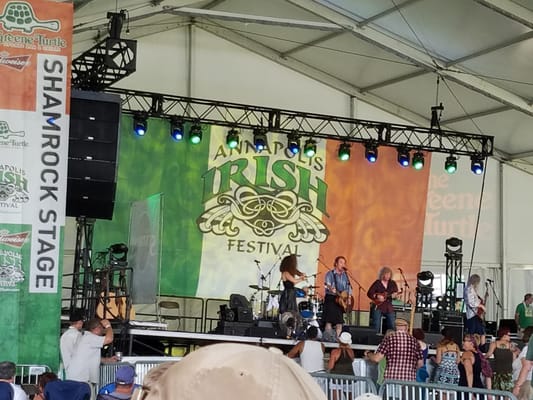 Performers on the shamrock stage