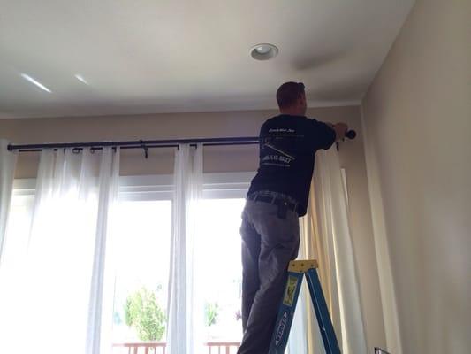 Dan installing our extra wide window treatment