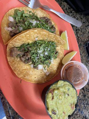 Two carne asasa tacos a la carte, & 4 oz guacamole