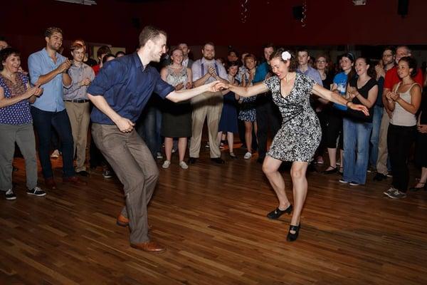 Ben White (owner) dancing with a guest at the Friday night dance