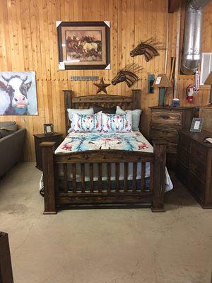 One of our rustic bedroom sets with a Bull Skull comforter.