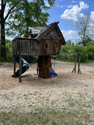 The really cool tree house in the play space.