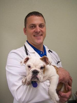 Dr. Hubenak and "Cupcake" the bulldog.